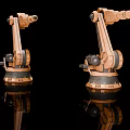 Two Copper Colored Robotic Arms On Black Background With Reflections