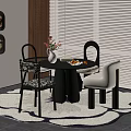 Stylish Restaurant Round Dining Table With Different Design Chairs Vase Flowers Fruits And Patterned Rug