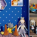 Stuffed Dolls Display With Blue Starry Background And Hexagon Display Frames On Shelves