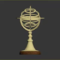 Stylish Golden Armillary Sphere Ornamental Furniture Accent With Intricate Structure And Wooden Base