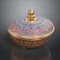 Decorative Floral Patterned Storage Box With Purple Gold Blue Design And Golden Spire Lid