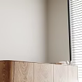 Notebook on Wooden Desk with Coffee Cup Glasses and Window Blinds