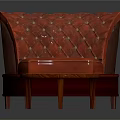 Red Tufted Leather Chair And Round Wooden Coffee Table With Wood Grain