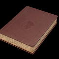 Brown Leather Bound Book With Circular Emblem On Cover And Vintage Pages