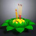 Decorative Green Lotus Shaped Plant With Yellow Center And Burning Candles Incense Sticks