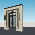 Elegant Entrance Gate With Carved Stone Details And Glass Door Panels