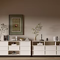 White Console Cabinet And Side Cabinet With Decorative Vases Books And Wall Painting