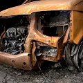 Rusted Damaged Van With Burnt Body And Broken Metal Parts