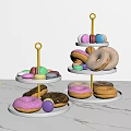 Two Tiered Dessert Stands With Colorful Donuts And Macarons On Marble Countertop