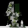 Elegant Floral Installation with White Flowers Green Foliage and Decorative Columns