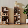 Modern Wooden Bookcase With Tiered Shelves Books Decorative Items Table Lamp And Potted Plant
