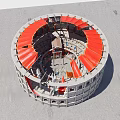 Ancient Circular Architecture with Red Roof Gray Walls and Intricate Internal Layout