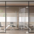 Modern Office Space With Glass Partitions Desks Chairs And Green Plant
