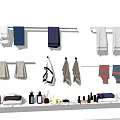 Soft Various Colored Bath Towels Hanging On Rods With Bathroom Toiletries And Accessories