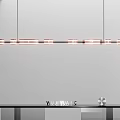 Modern Interior Design With Stylish Linear Pendant Light Hanging Above Dining Table