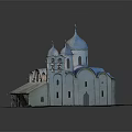 Traditional Church Building With Blue Domes White Walls Bell Tower And Arched Windows On Grass