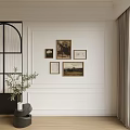 Interior Wall Decor With Five Artworks Black Arched Partition And Green Plant
