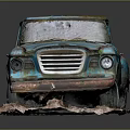 Old Blue Rusty Vintage Truck With Weathered Exterior On Dirt Ground