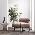 Modern Brown Velvet Single Sofa With Metal Frame And Green Plant In Bright Interior Space
