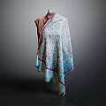 Patterned Shawl With Pink Trim On Mannequin Against Gray Background