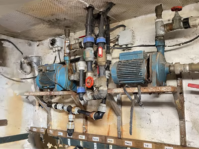 Industrial Mechanical Pipes System With Blue Pumps Valves And Motors In Workshop Facility 3d model