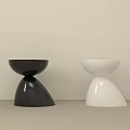 Modern Black and White Side Tables with Unique Curved Base and Round Top Design