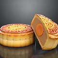 Traditional Chinese Golden Mooncake With Whole And Cut Design Showing Yolk Filling