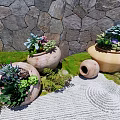 Succulent Plant Combinations In Terracotta Planters With Stone Wall Background And Green Foliage