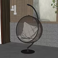 Modern Spherical Hanging Chair with Metal Frame and Gray Cushions in Indoor Setting