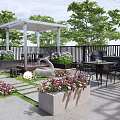 Modern Garden Patio Design With Outdoor Table Chairs Lush Plants Flowers And Pergola