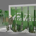 Green Exhibition Booth with Fairy Text Clothing Display and Cacti Plants Decorations