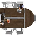 Oval Wooden Conference Table With White Office Chairs Laptop Display Stand And Working Person