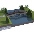 Traditional Chinese Arch Bridge With Black Tile Roof Over Pond Green Grass And Trees