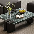 Green Marble Coffee Table with Black Legs Vase White Flowers Fruit Bowl and Open Book