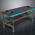 Rusted Green Frame Cart with Black Countertop Red Straps Chains and Wheels