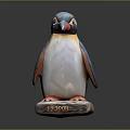 Decorative Penguin Statue With Colorful Feathers Standing On Wooden Base With Engraved PENGUIN Text