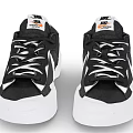 Nike Black And White Low Top Sneakers With White Sole And Lace Up Design