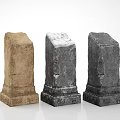 Three Stone Pillars With Different Colors Carved Bases And Textured Surfaces
