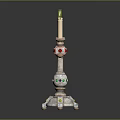 Decorative Candelabra With Three Lit Candles And Colorful Accents On Base