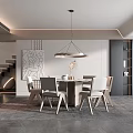 Modern Restaurant Dining Area With Round Table Chairs Hanging Pendant Light Decorative Painting And Bookshelf
