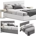 Cozy Modern Double Bed With Gray Bedding Headboard Folded Blanket And Round Nightstand