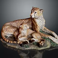 Cheetah Sculpture Featuring Mother and Cub with Green Grass Base and Detailed Texture