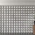 Luminous Grid Background Wall with Illuminated Squares Wooden Pedestal Black Vase and Green Plant