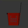 Red Plastic Shopping Basket With Black Handle On Gray Background