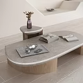 Modern Coffee Table With Grey Stone Top And Wooden Legs Featuring Tray Books And Candle