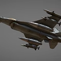 Military Fighter Jet With Gray Camouflage Paint Golden Nose Cone Mounted Missiles And Wing Markings