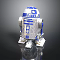 R2 D2 Robot Character With Blue White Design Silver Accents And Shiny Surface