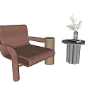 Brown Single Sofa With Cylindrical Side Table Grey Small Table And Vase With Dried Plants 3d model