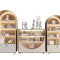 Beige Arched Display Cabinets With Rabbit Dolls Decorative Items And Warm Lighting