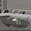Modern Beige Sectional Sofa and Coffee Table Set With Decorative Pillows and Green Plant
